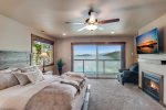 2nd master bedroom has King bed, luxury linens, fireplace and private waterfront deck.